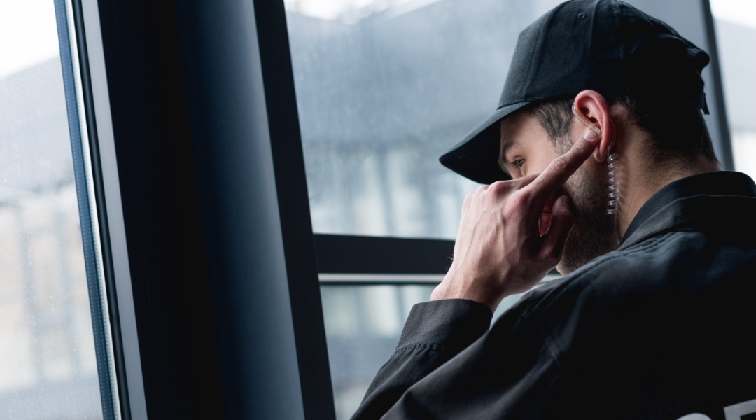 security guard receiving a radio message