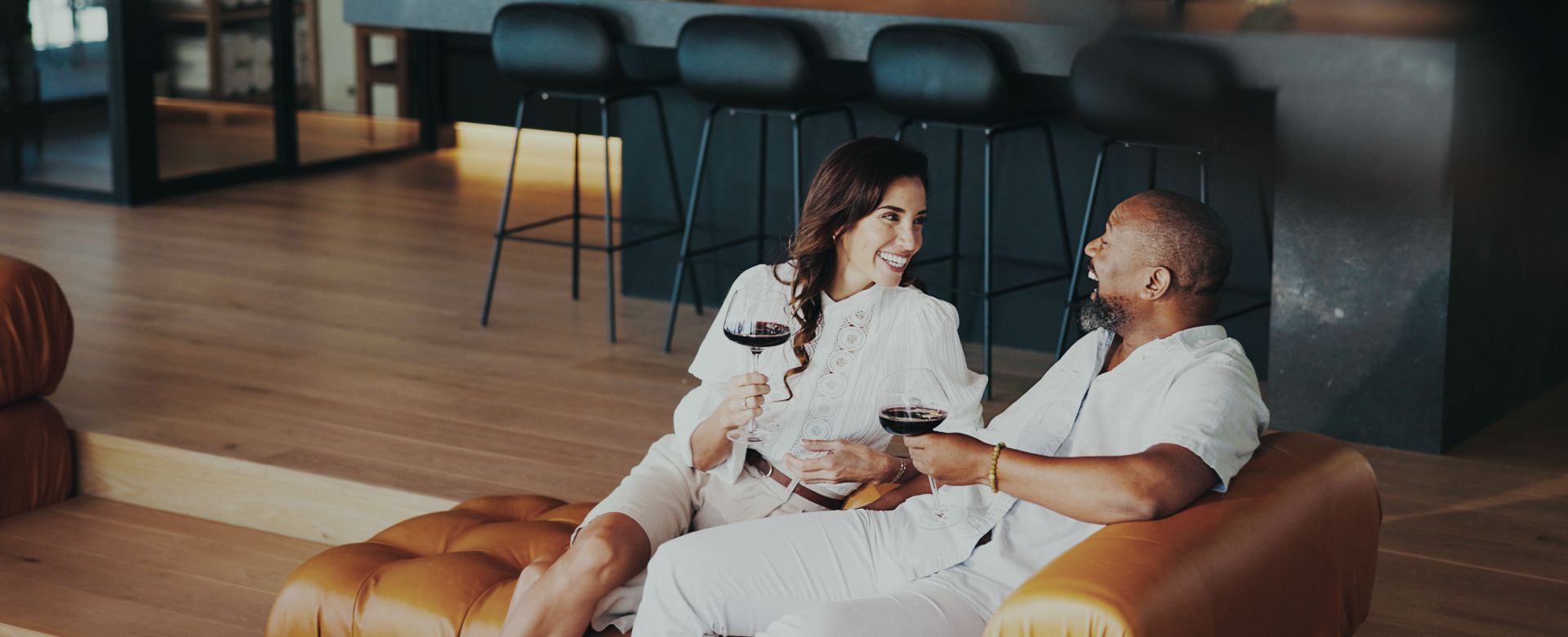 HNW couple relaxing at home