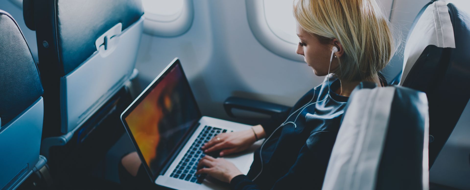 business traveller on flight